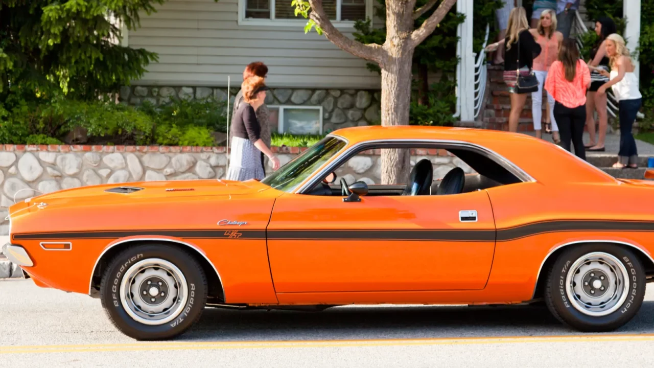 Orange Dodge Challenger at roadside
