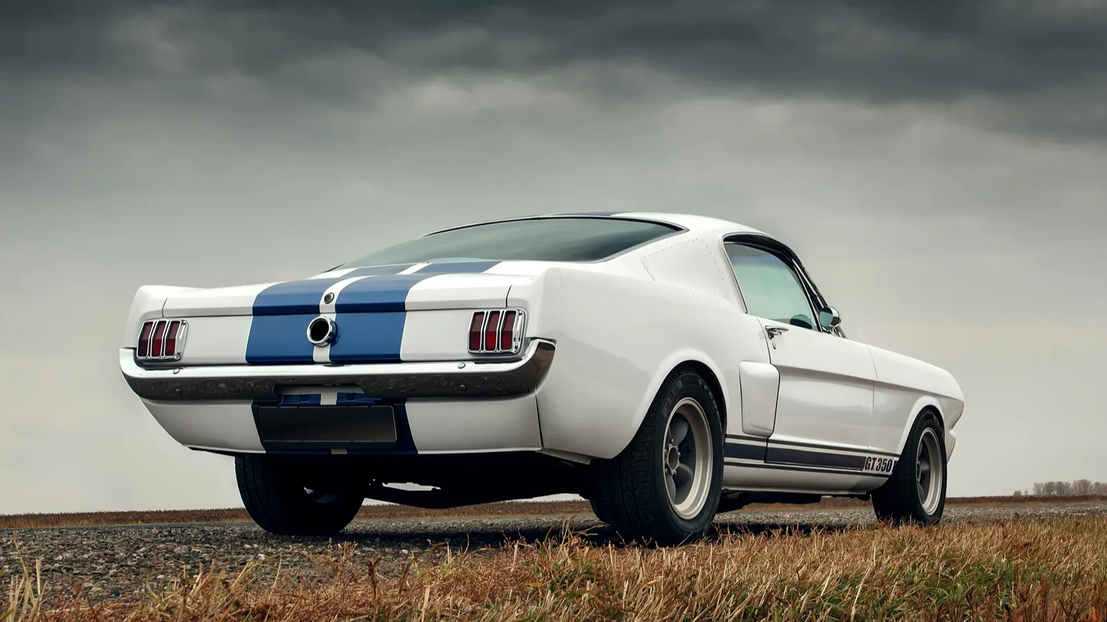 Retro muscle car Ford Mustang Shelby on the road