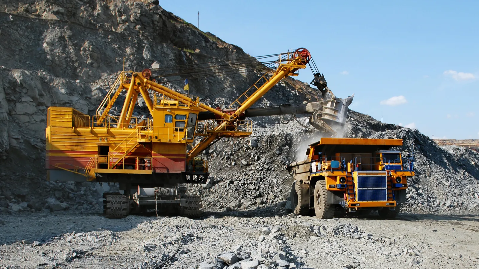Mining of minerals with heavy machinery.