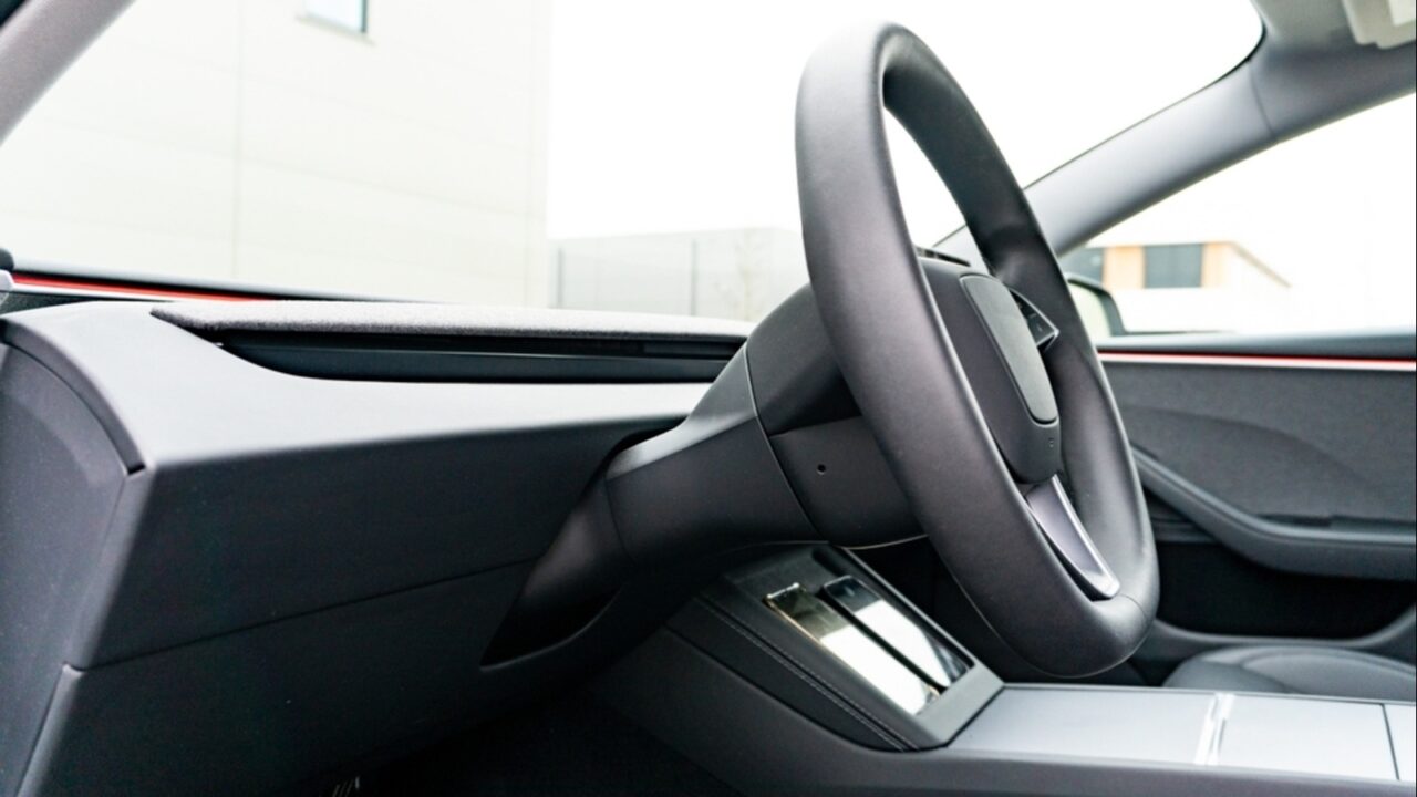 Tesla steering wheel interior shot