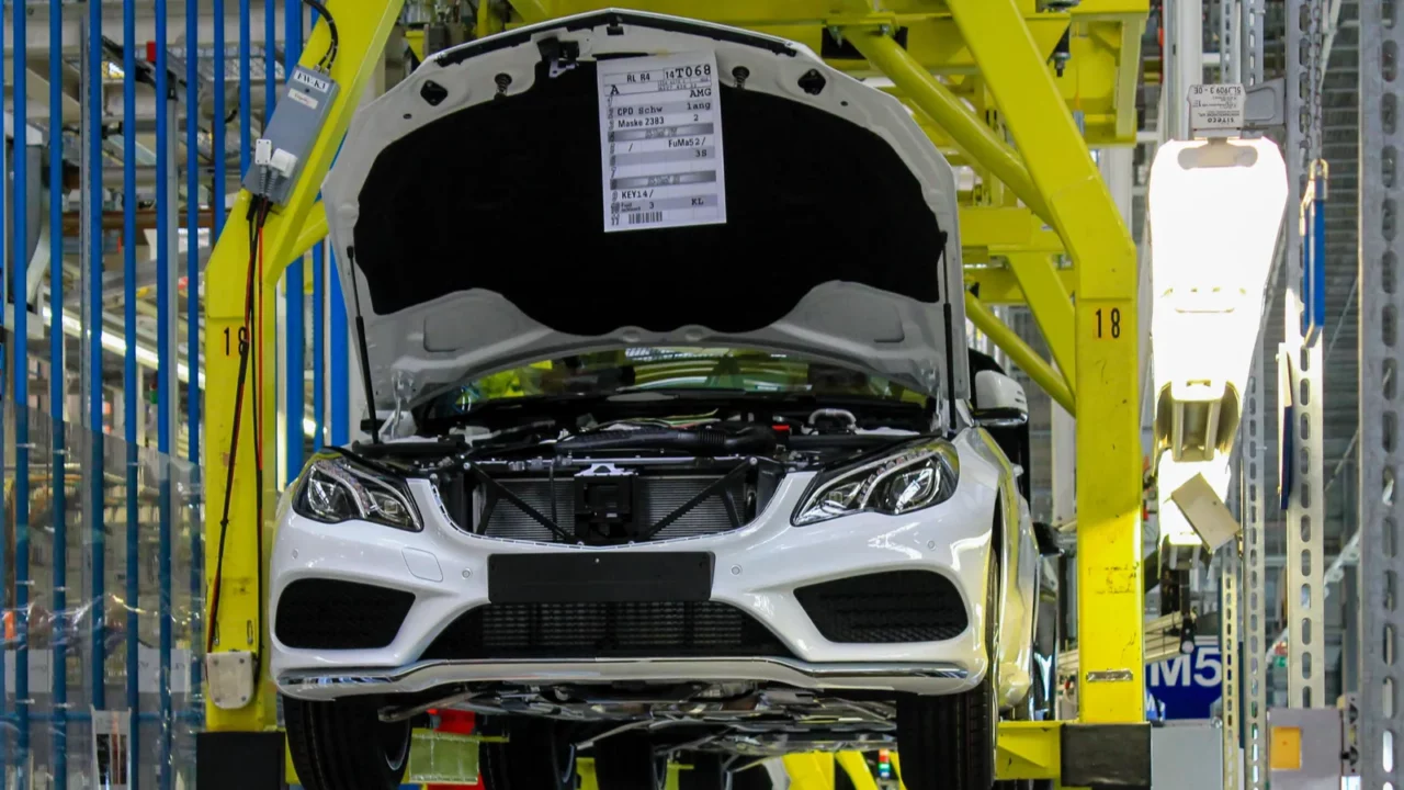 White mercedes benz amg car body goes in Bremen.