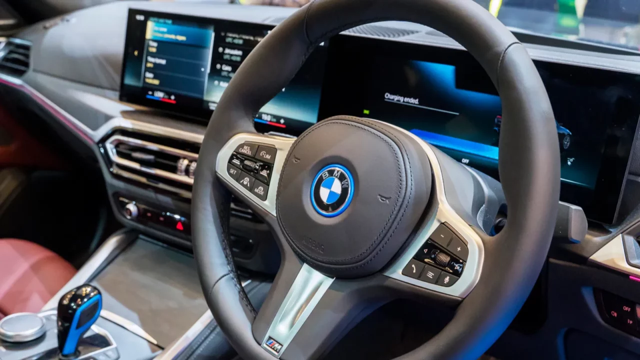 Close up of steering wheel of BMW car.